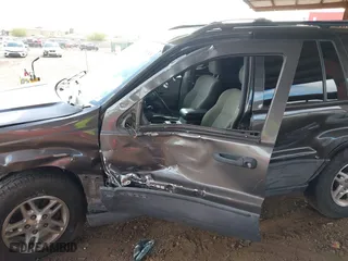 2004 Jeep Grand Cherokee Laredo with VIN 1J4GX48N64C436853, listed as a IAAI auction lot 41785918 with 118,578 mi miles. Bid and sale history available at carsss.com. Image 6.