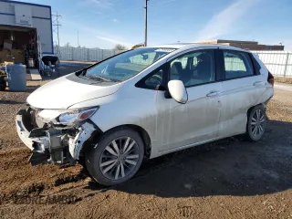2015 Honda Fit EX-L with VIN 3HGGK5H83FM740309, listed as a Copart auction lot 42980665 with 118,188 mi miles and Salvage Title. Bid and sale history available at carsss.com. Image 1.