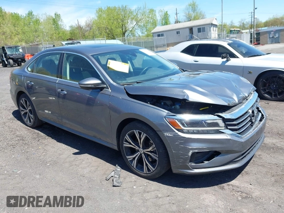 2021 Volkswagen Passat SE with VIN 1VWSA7A39MC011507, listed as a IAAI auction lot 42160879 with 82,639 mi miles and . Bid and sale history available at DreamBid. Image 1.