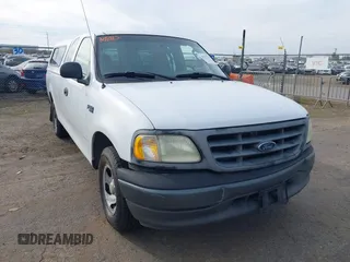 2002 Ford F-150 XL with VIN 1FTRX17222NB82564, listed as a IAAI auction lot 41701719 with 1 mi miles. Bid and sale history available at carsss.com. Image 1.
