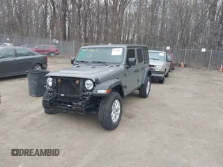 2023 Jeep Wrangler Sport S with VIN 1C4HJXDN0PW638934, listed as a IAAI auction lot 41719467 with 16,686 mi miles and . Bid and sale history available at DreamBid. Image 2.