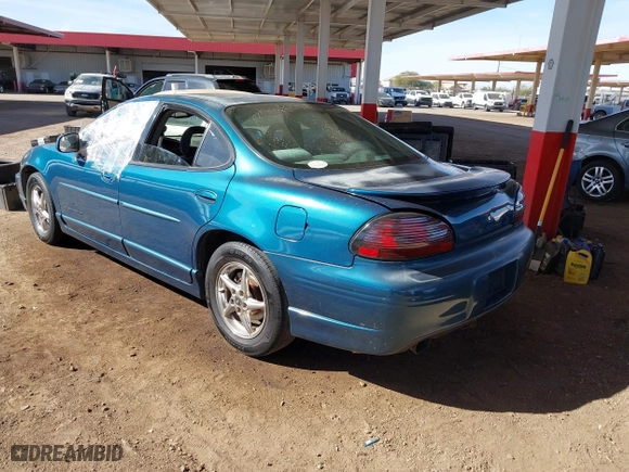 2003 Pontiac Grand Prix GT with VIN 1G2WP52K13F152876, listed as a IAAI auction lot 41426333 with 258,237 mi miles. Bid and sale history available at carsss.com. Image 3.