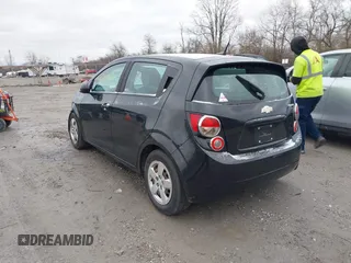 2014 Chevrolet Sonic LS with VIN 1G1JA6SH6E4139131, listed as a IAAI auction lot 41727625 with 97,241 mi miles and . Bid and sale history available at DreamBid. Image 3.