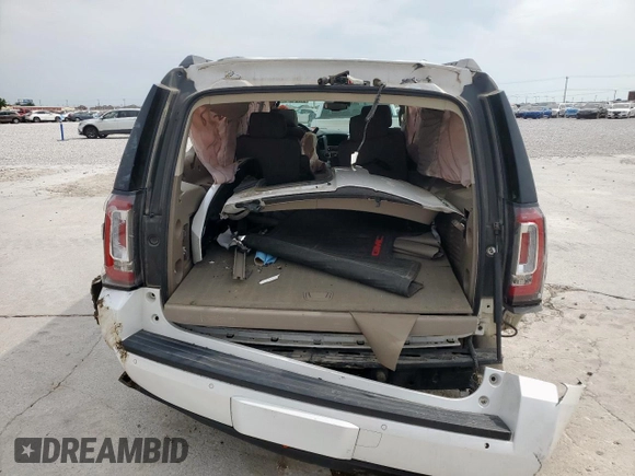 2016 GMC Yukon XL SLT z VIN 1GKS1GKC1GR252081, wystawiony jako Copart lot #53354975 z przebiegiem 200 621 mil mil oraz Szkoda całkowita • Salvage title. Historia ofert i sprzedaży dostępna na DreamBid. Obrazek 6.