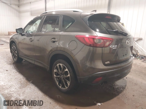 2016 Mazda CX-5 Grand Touring with VIN JM3KE4DY0G0732843, listed as a IAAI auction lot 41520889 with 149,798 mi miles. Bid and sale history available at carsss.com. Image 3.