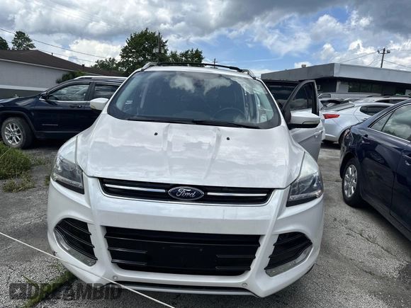 2013 Ford Escape Titanium with VIN 1FMCU9J95DUB21698, listed as a IAAI auction lot 42694998 with 170,593 mi miles and . Bid and sale history available at DreamBid. Image 11.