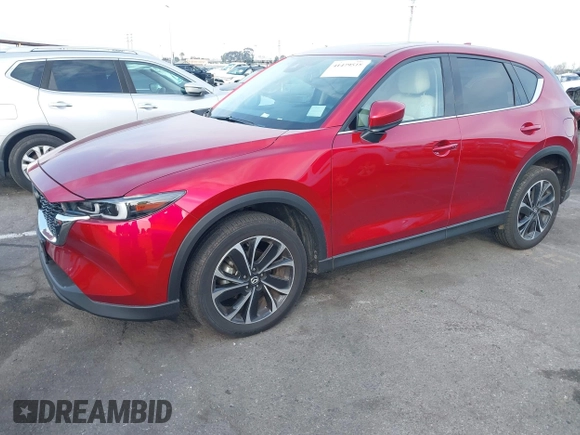 2023 Mazda CX-5 S Premium with VIN JM3KFBDM2P0130525, listed as a IAAI auction lot 41479518 with 18,145 mi miles and . Bid and sale history available at DreamBid. Image 2.