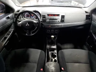 2010 Mitsubishi Lancer GTS with VIN JA32U8FW0AU027070, listed as a Copart auction lot 49516945 with 130,560 mi miles and Salvage Title. Bid and sale history available at carsss.com. Image 8.
