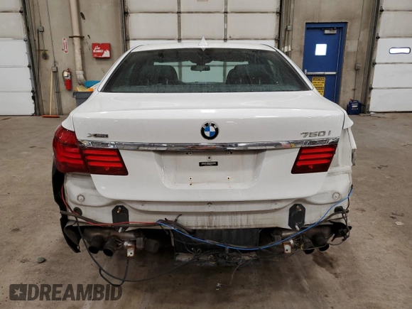 2015 BMW 7 Series 750i xDrive with VIN WBAYB6C54FD965787, listed as a Copart auction lot 89061355 with 104,633 mi miles and Salvage Title. Bid and sale history available at carsss.com. Image 6.