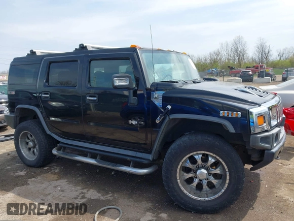 2007 Hummer H2 SUV z VIN 5GRGN23UX7H112972, wystawiony jako IAAI lot #41980625 z przebiegiem 214 857 mil mil oraz . Historia ofert i sprzedaży dostępna na DreamBid. Obrazek 14.