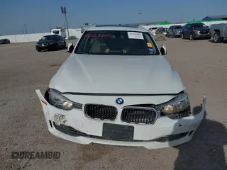 2014 BMW 3 Series 328i with VIN WBA3A5G5XENP32345, listed as a IAAI auction lot 42303835 with 100,235 mi miles and . Bid and sale history available at DreamBid. Image 12.