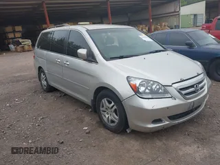 2007 Honda Odyssey EX with VIN 5FNRL384X7B036281, listed as a IAAI auction lot 42058864 with 240,791 mi miles. Bid and sale history available at carsss.com. Image 1.