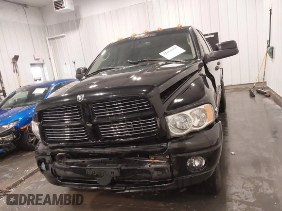 2005 Dodge Ram 3500 SLT with VIN 3D7LS38C85G810265, listed as a IAAI auction lot 41856058 with 164,027 mi miles. Bid and sale history available at carsss.com. Image 12.