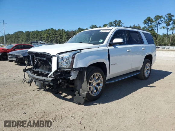 2016 GMC Yukon SLT with VIN 1GKS1BKC4GR138658, listed as a Copart auction lot 76634664 with 132,358 mi miles and Salvage Title. Bid and sale history available at carsss.com. Image 1.