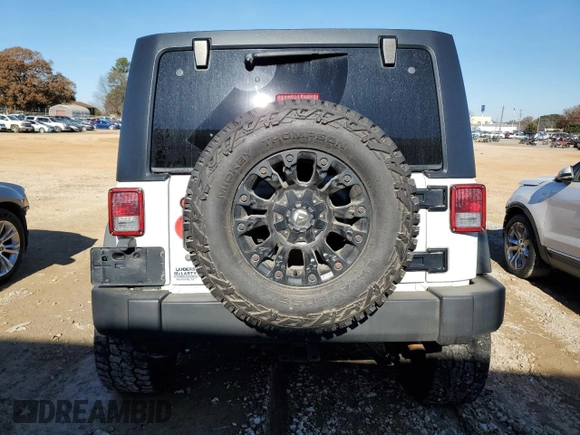 2016 Jeep Wrangler Unlimited Rubicon Hard Rock with VIN 1C4BJWFG2GL243895, listed as a Copart auction lot 84698754 with 0 mi miles and Non Repairable. Bid and sale history available at carsss.com. Image 6.