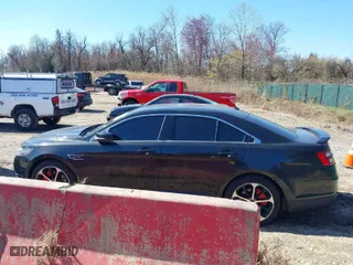 2014 Ford Taurus SHO with VIN 1FAHP2KT0EG164404, listed as a IAAI auction lot 41899695 with 157,077 mi miles. Bid and sale history available at carsss.com. Image 15.