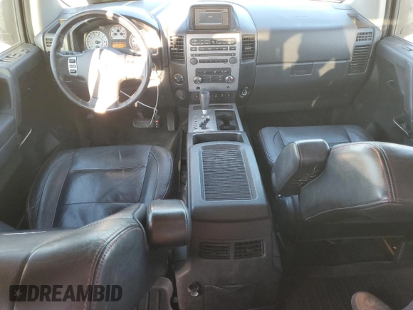 2012 Nissan Titan S with VIN 1N6AA0EC2CN326942, listed as a Copart auction lot 77826664 with 157,120 mi miles and Clean Title. Bid and sale history available at carsss.com. Image 8.