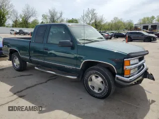 1998 Chevrolet Silverado 1500 with VIN 2GCEK19R4W1143733, listed as a Copart auction lot 54298895 with 210,091 mi miles and Salvage Title. Bid and sale history available at DreamBid. Image 4.