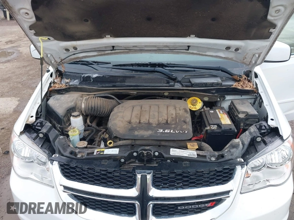 2017 Dodge Grand Caravan SXT with VIN 2C4RDGCG4HR662744, listed as a IAAI auction lot 41910753 with 73,060 mi miles and . Bid and sale history available at DreamBid. Image 10.