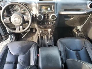 2015 Jeep Wrangler Unlimited Rubicon with VIN 1C4BJWFG7FL732694, listed as a Copart auction lot 42977435 with 128,759 mi miles and Salvage Title. Bid and sale history available at carsss.com. Image 8.