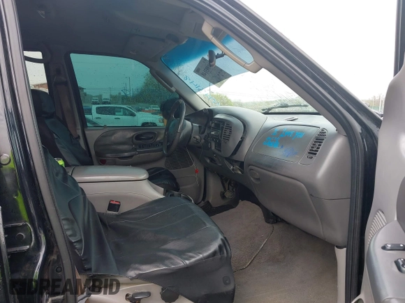 2002 Ford F-150 XLT with VIN 1FTRW08L72KD27457, listed as a IAAI auction lot 41993148 with 372,589 mi miles. Bid and sale history available at carsss.com. Image 5.