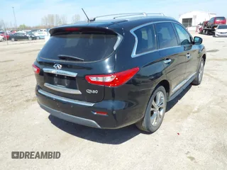 2014 Infiniti QX60 with VIN 5N1AL0MM1EC542704, listed as a IAAI auction lot 42046845 with 76,128 mi miles and . Bid and sale history available at DreamBid. Image 4.