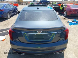 2021 Cadillac CT5 Luxury z VIN 1G6DW5RKXM0144424, wystawiony jako IAAI lot #41985803 z przebiegiem 65 555 mil mil oraz . Historia ofert i sprzedaży dostępna na DreamBid. Obrazek 16.