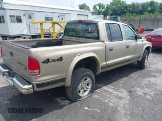 2004 Dodge Dakota SLT with VIN 1D7HG48N54S720724, listed as a IAAI auction lot 42740246 with 153,504 mi miles and . Bid and sale history available at DreamBid. Image 4.