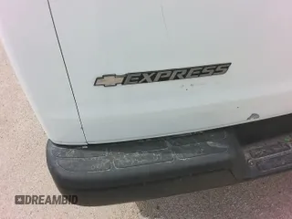2013 Chevrolet Express Cargo Van with VIN 1GCWGFCA3D1139097, listed as a IAAI auction lot 42191095 with 171,794 mi miles. Bid and sale history available at carsss.com. Image 1.