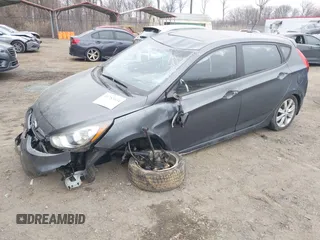 2013 Hyundai Accent SE with VIN KMHCU5AE1DU091931, listed as a IAAI auction lot 41783034 with 72,732 mi miles. Bid and sale history available at carsss.com. Image 17.