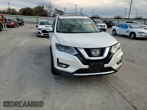 2017 Nissan Rogue SL with VIN 5N1AT2MT0HC825974, listed as a Copart auction lot 83856374 with Not provided miles and Salvage title. Bid and sale history available at DreamBid. Image 11.