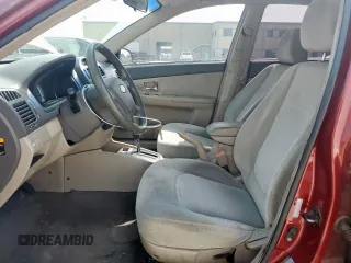 2007 Kia Spectra EX with VIN KNAFE122475378574, listed as a Copart auction lot 56921925 with 142,268 mi miles and Salvage title. Bid and sale history available at DreamBid. Image 7.