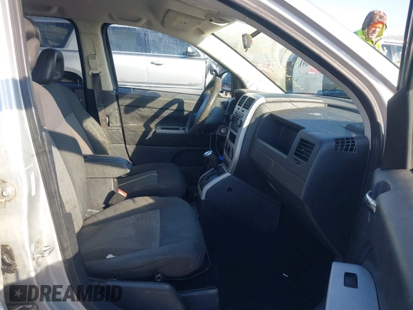 2008 Jeep Compass Sport with VIN 1J8FT47098D665734, listed as a IAAI auction lot 41561801 with 169,446 mi miles. Bid and sale history available at carsss.com. Image 5.