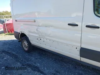 2023 Ford Transit Cargo with VIN 1FTBR2C8XPKA33372, listed as a IAAI auction lot 41735299 with 56,777 mi miles and . Bid and sale history available at DreamBid. Image 6.