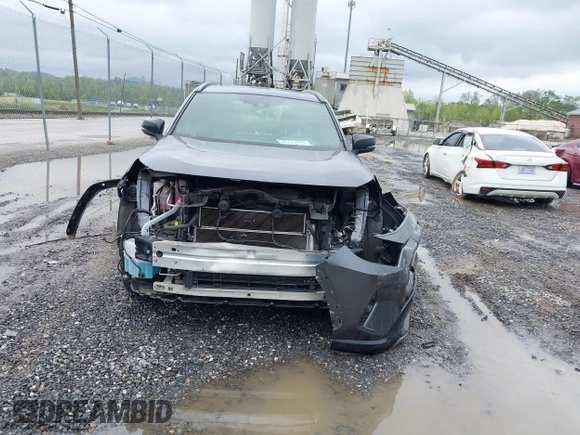 2021 Toyota RAV4 Hybrid XSE with VIN JTME6RFV0MD515817, listed as a IAAI auction lot 42127698 with 98,078 mi miles and . Bid and sale history available at DreamBid. Image 13.