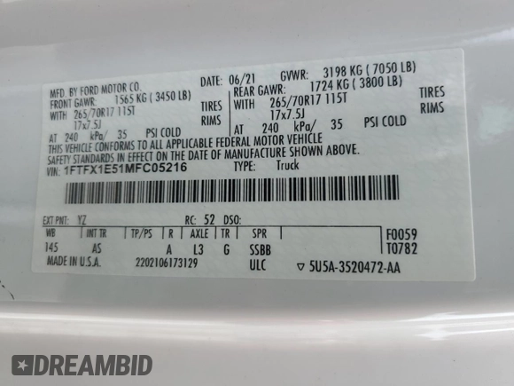 2021 Ford F-150 XL with VIN 1FTFX1E51MFC05216, listed as a Copart auction lot 56571785 with 94,584 mi miles and Salvage title. Bid and sale history available at DreamBid. Image 12.