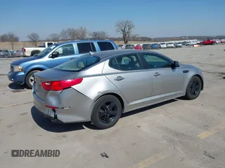 2015 Kia Optima LX with VIN 5XXGM4A78FG477630, listed as a IAAI auction lot 41771874 with 107,065 mi miles and . Bid and sale history available at DreamBid. Image 4.