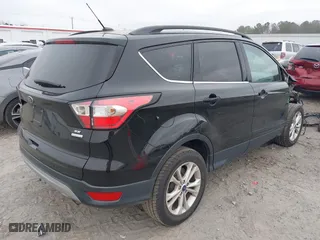 2018 Ford Escape SE with VIN 1FMCU0GD1JUB03329, listed as a IAAI auction lot 41040155 with 61,006 mi miles. Bid and sale history available at carsss.com. Image 4.