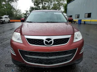 2012 Mazda CX-9 Grand Touring z VIN JM3TB2DV8C0340811, wystawiony jako Copart lot #56756905 z przebiegiem 102 972 mil mil oraz Szkoda całkowita • Salvage title. Historia ofert i sprzedaży dostępna na DreamBid. Obrazek 5.
