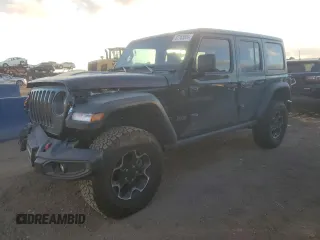 2023 Jeep Wrangler Rubicon with VIN 1C4HJXFG6PW655624, listed as a Copart auction lot 87168054 with 24,058 mi miles and Salvage Title. Bid and sale history available at DreamBid. Image 1.