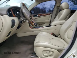 2006 Jaguar XJ with VIN SAJWA79B76SH08803, listed as a Copart auction lot 40268774 with 0 mi miles and Salvage Title. Bid and sale history available at carsss.com. Image 7.