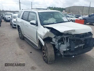 2014 Toyota 4Runner SR5 with VIN JTEZU5JR7E5080554, listed as a IAAI auction lot 42134833 with 170,077 mi miles and . Bid and sale history available at DreamBid. Image 1.
