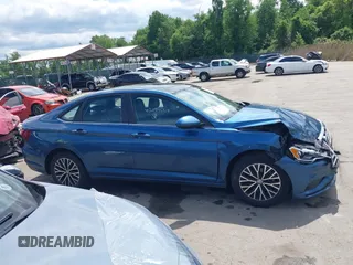 2021 Volkswagen Jetta S z VIN 3VWC57BU6MM046066, wystawiony jako IAAI lot #42199064 z przebiegiem 86 394 mil mil oraz . Historia ofert i sprzedaży dostępna na DreamBid. Obrazek 13.