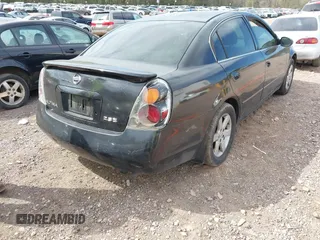 2003 Nissan Altima S with VIN 1N4AL11D03C165042, listed as a IAAI auction lot 41888473 with 306,629 mi miles. Bid and sale history available at carsss.com. Image 6.