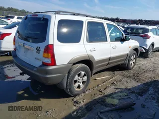 2004 Mazda Tribute ES with VIN 4F2CZ06164KM12579, listed as a IAAI auction lot 41654646 with 208,120 mi miles. Bid and sale history available at carsss.com. Image 4.