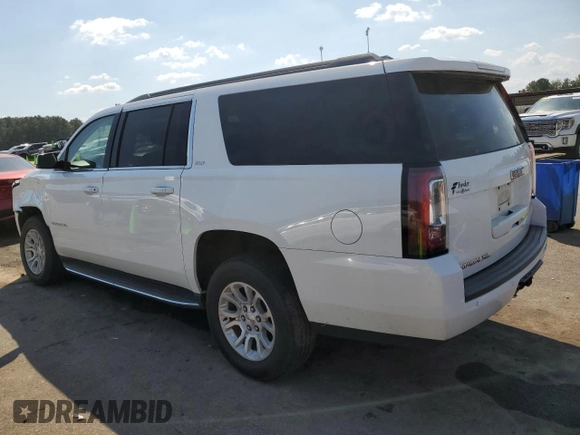2019 GMC Yukon XL SLT with VIN 1GKS1GKCXKR239712, listed as a Copart auction lot 74721584 with 143,690 mi miles and Salvage Title. Bid and sale history available at carsss.com. Image 2.