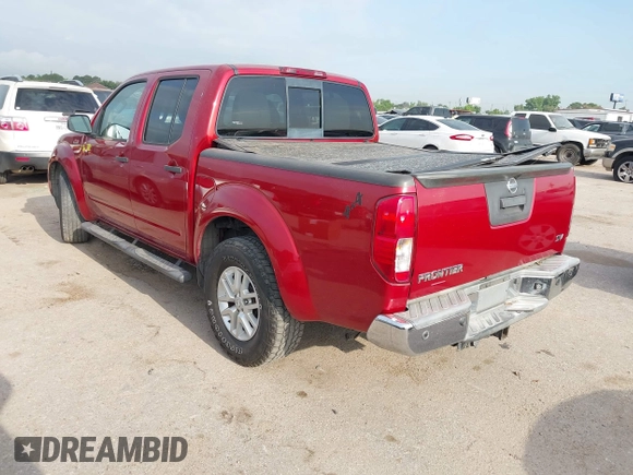 2014 Nissan Frontier SV with VIN 1N6AD0ER0EN749033, listed as a IAAI auction lot 42036166 with 152,276 mi miles and . Bid and sale history available at DreamBid. Image 3.