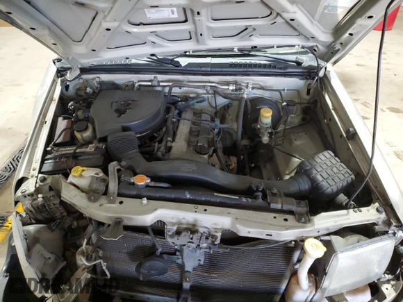 2000 Nissan Frontier XE with VIN 1N6DD26S8YC337811, listed as a Copart auction lot 54775915 with 129,427 mi miles and Salvage title. Bid and sale history available at DreamBid. Image 11.