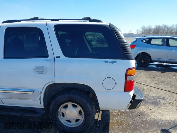 2003 GMC Yukon SLT with VIN 1GKEC13Z13J197955, listed as a IAAI auction lot 41586841 with 208,752 mi miles. Bid and sale history available at carsss.com. Image 20.