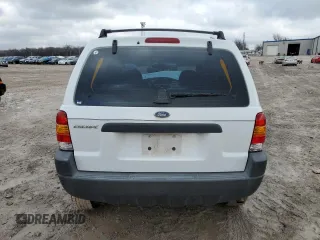 2004 Ford Escape XLS with VIN 1FMYU02144DA18217, listed as a Copart auction lot 43136895 with 135,424 mi miles and Salvage Title. Bid and sale history available at DreamBid. Image 6.